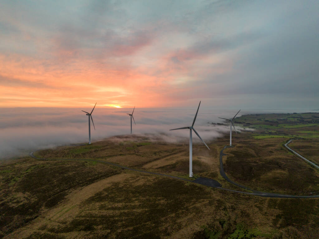 Misty Sunrise over an onshore wind farm