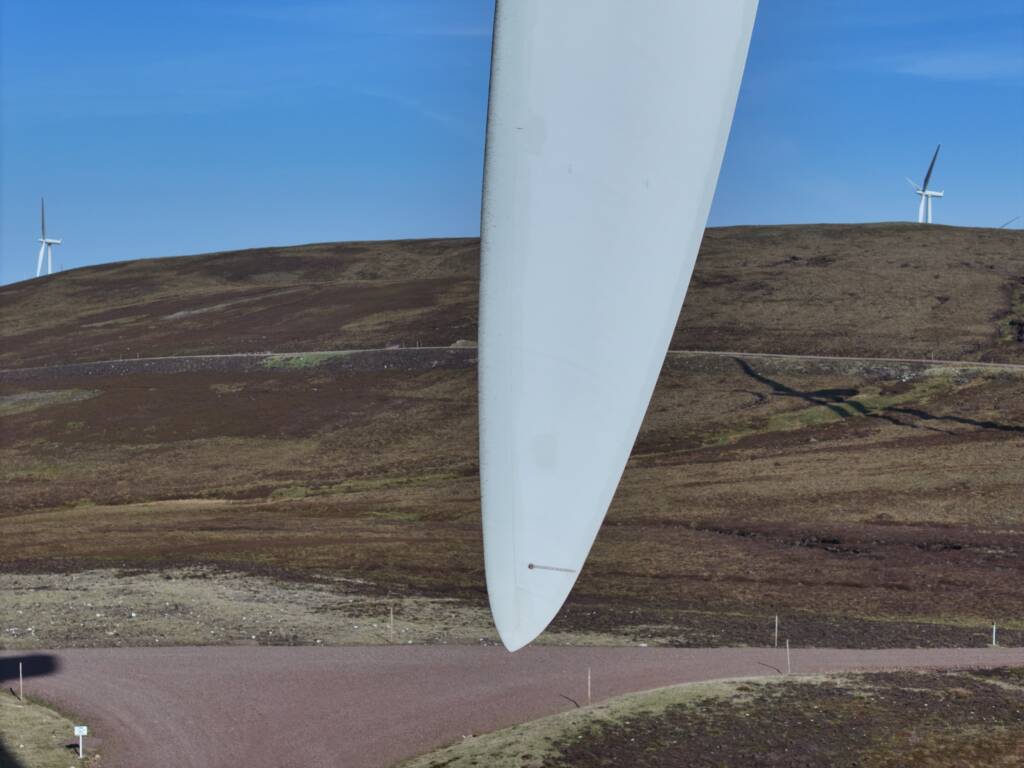 Tip of a blade wind turbine during a drone inspection